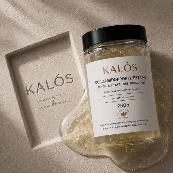 Jar of Kalós cosmetic ingredient on a textured beige background