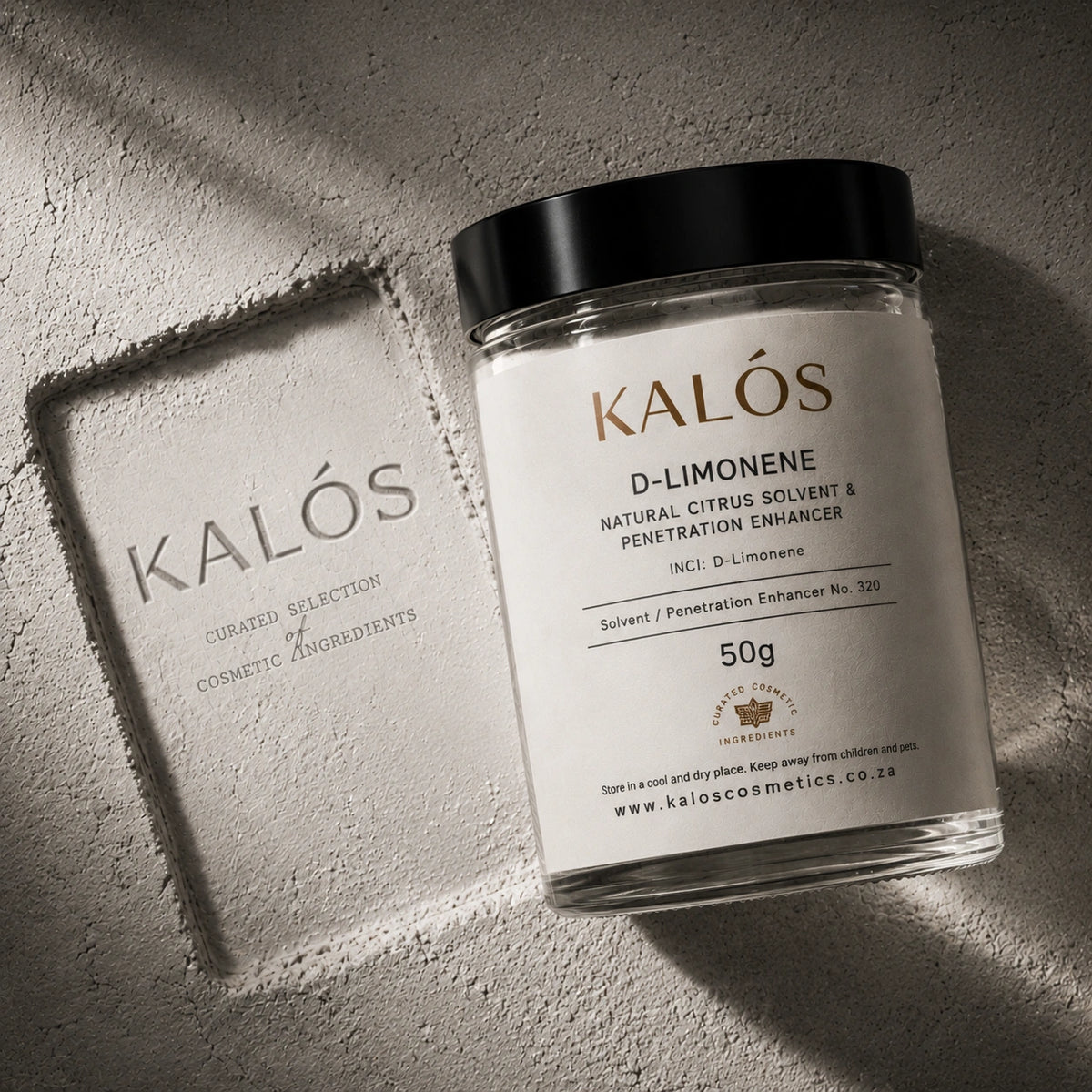 Jar of Kalós D-Limonene on a textured surface