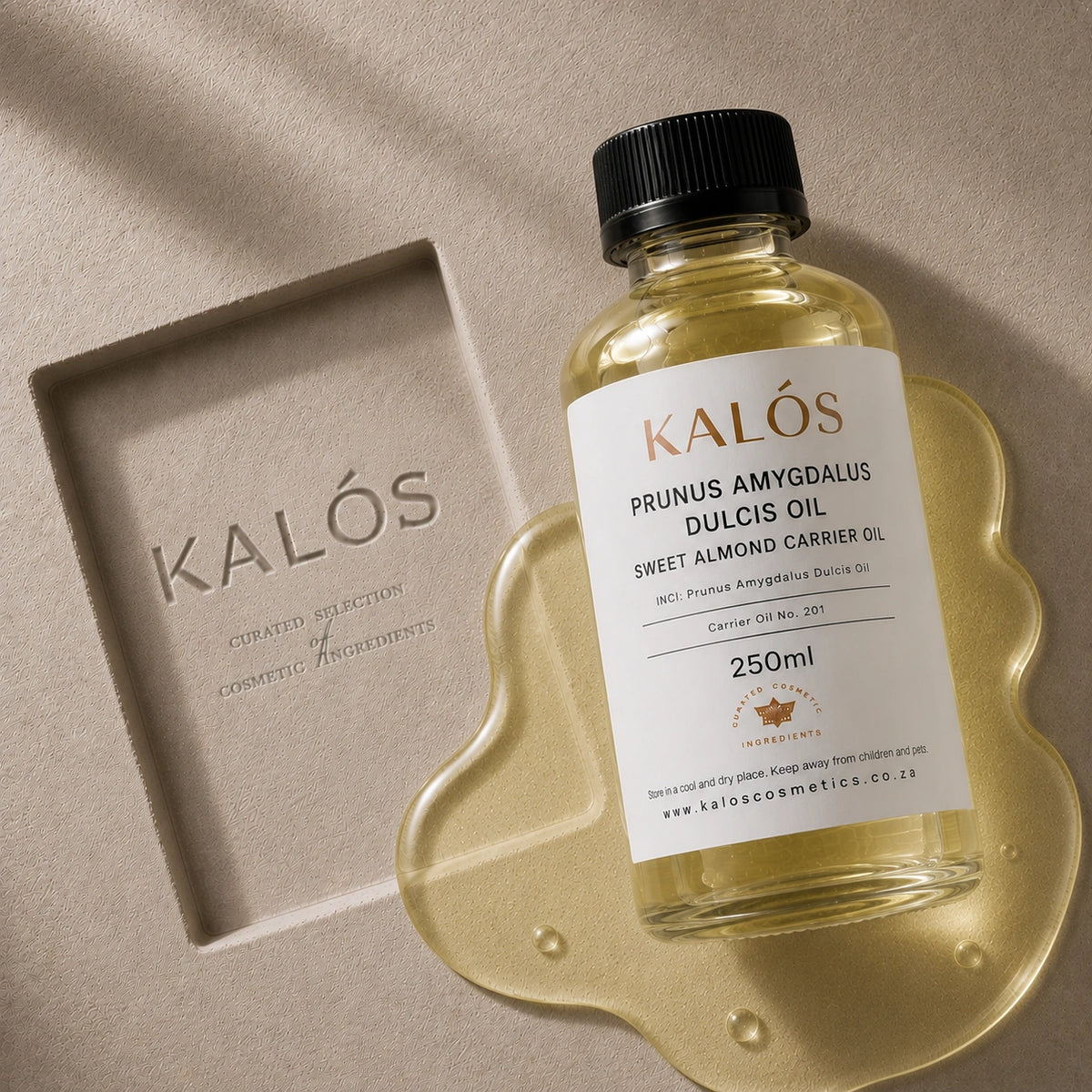 Bottle of Kalós Prunus Amygdalus Dulcis Oil on a beige background