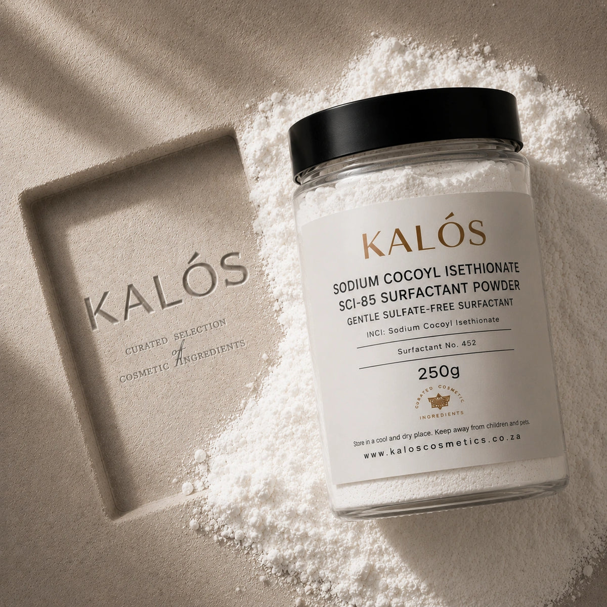 Jar of Kalós sodium cocoyl isethionate powder on a textured surface